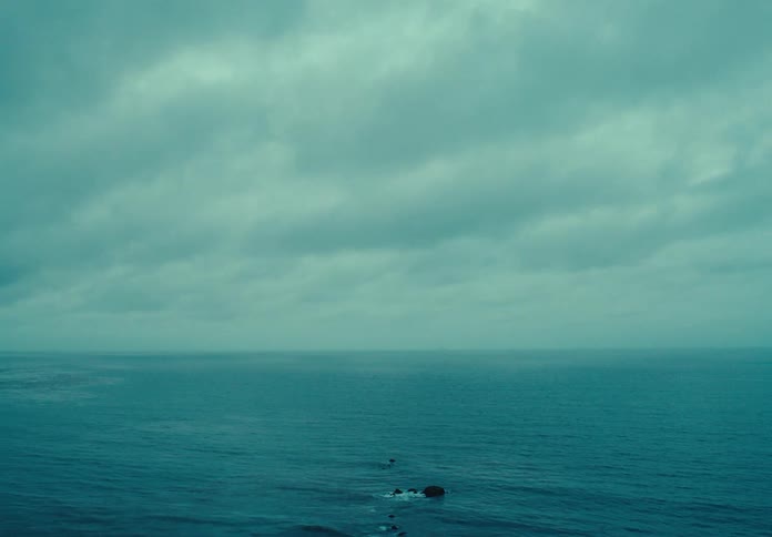 Panorama of a vast ocean on a cloudy day