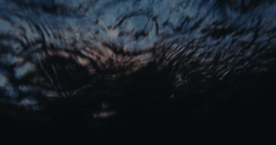 Underwater view of the ocean with waves passing by in a morning