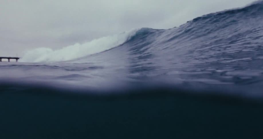 Ocean waves near the coast under an overcast day