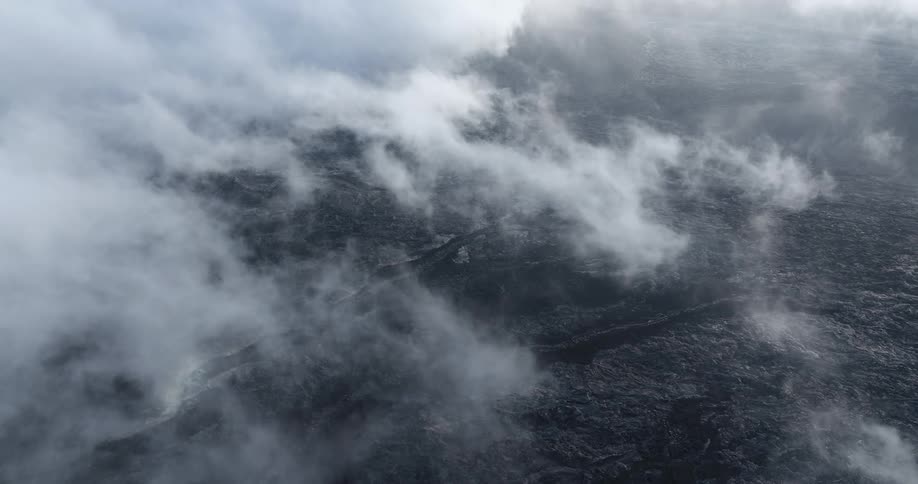 Aerial panorama of volcanic craters and clouds passing by