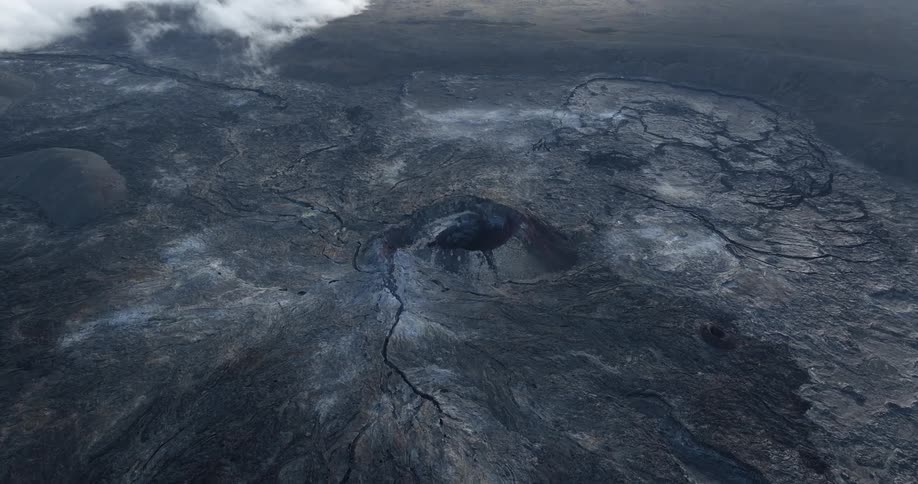 Aerial panorama of crater and a volcano on black rocks