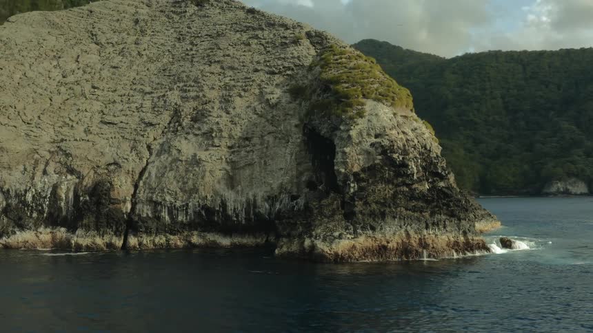 Aerial view of a rocky crust by the sea