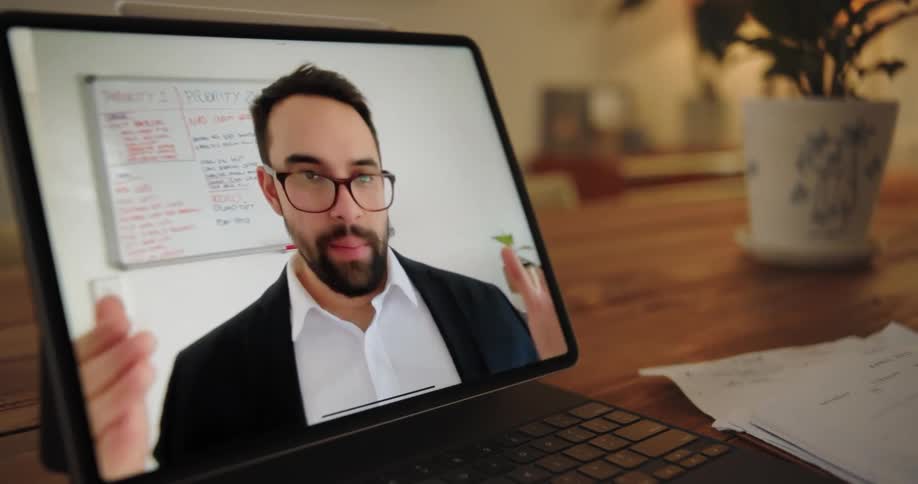 A man is giving a speech on the tablet