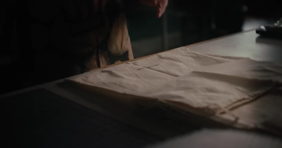 Woman stamping a fabric bag