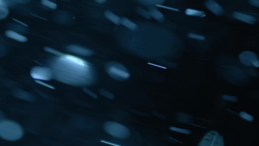 Abstract rotating moving water with bubbles