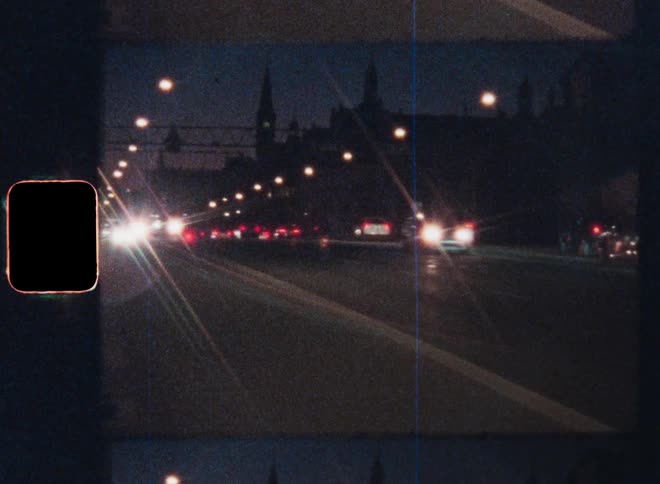 Cars driving on city highway at night