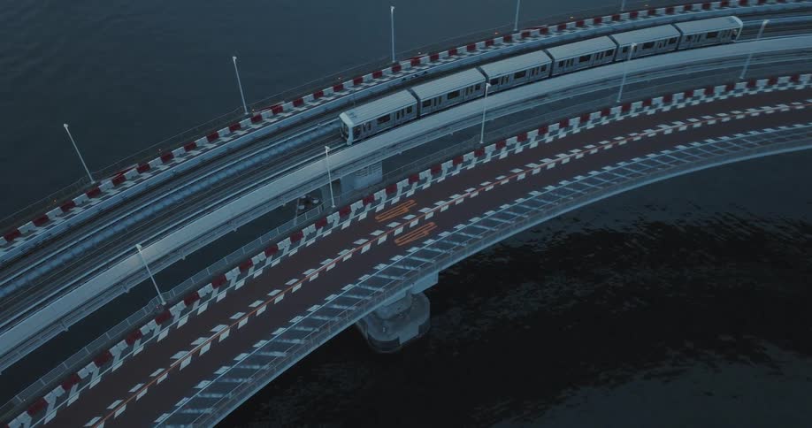 Aerial view of Tokyo's waterfront and golden bridge loop