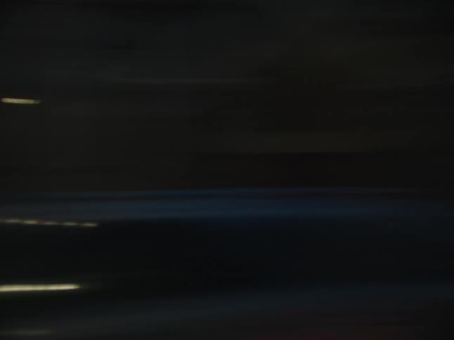 The downtown area of the city is visible from cars driving on the highway