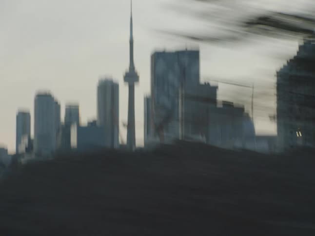 Tall buildings are in the distance
