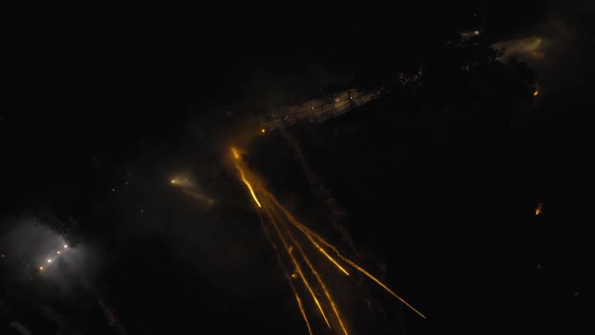 Fireworks are shot into the night sky