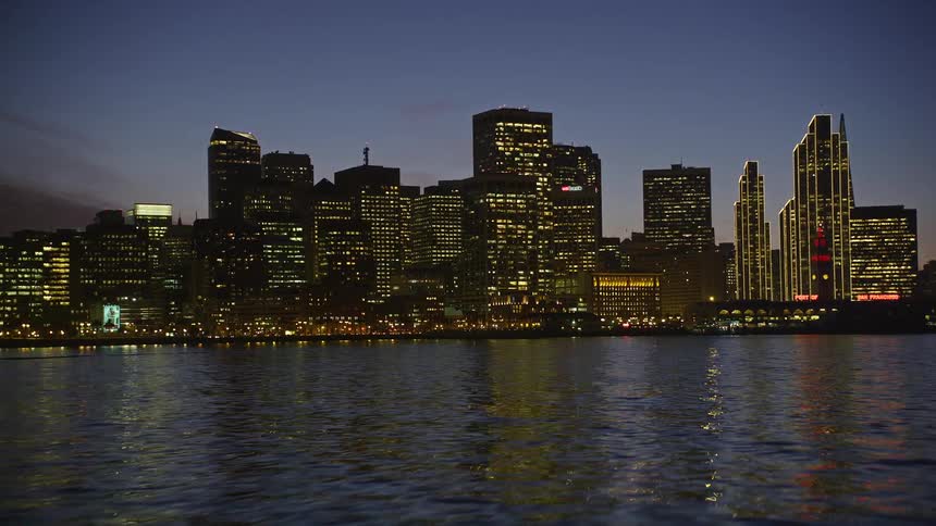 The san francisco city skyline and waterfront in the evening