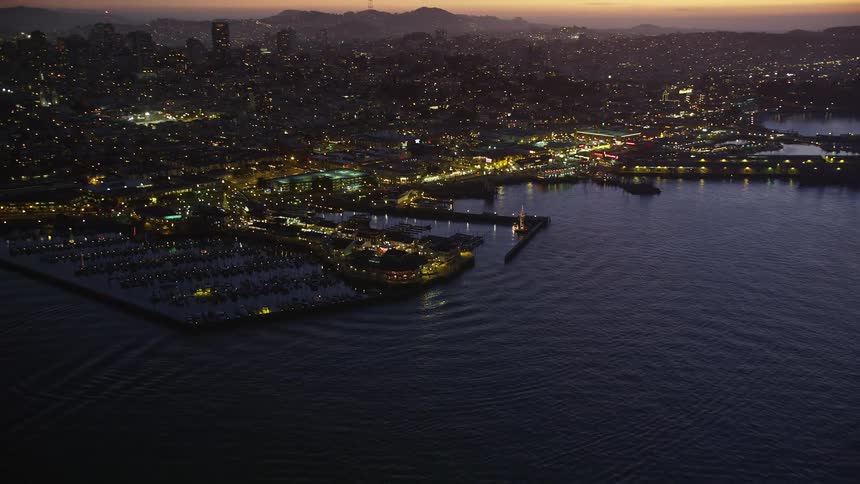 A night clip of a sea side at the urban city