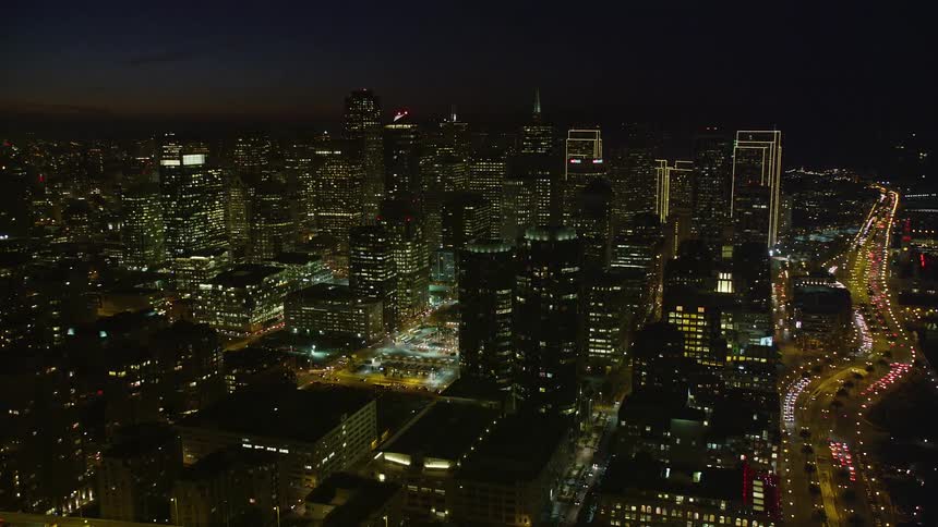 Aerial panorama of urban and commercial buildings illuminated at night