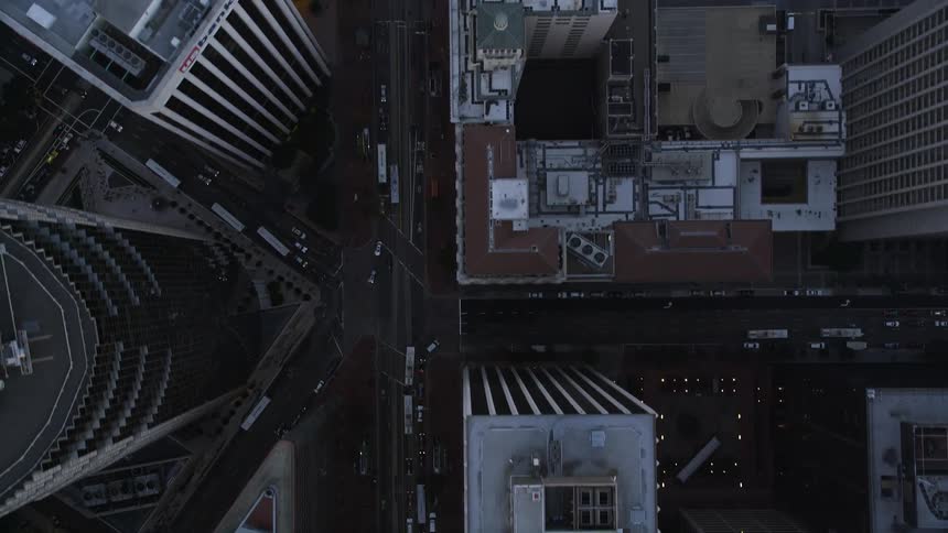 An overhead shot of a city during dusk