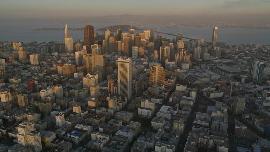 Aerial view of san francisco showing the golden gate bridge and the citys dense skyline