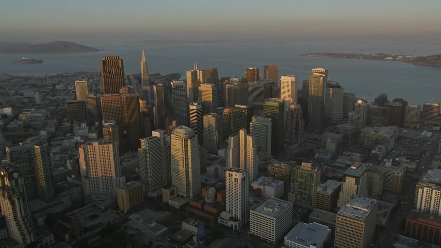 A large city sitting on the coast of a bay