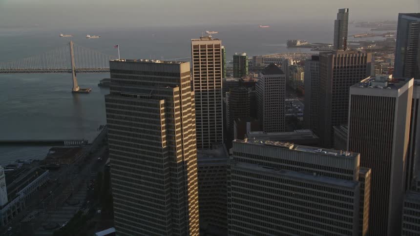 Aerial panorama of large commercial and urban buildings by the sea
