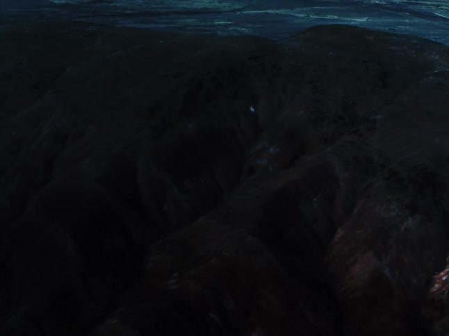 Aerial panorama of a rocky mountain by the sea