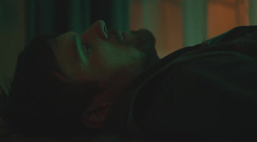 A clip of a man laying down and rising up