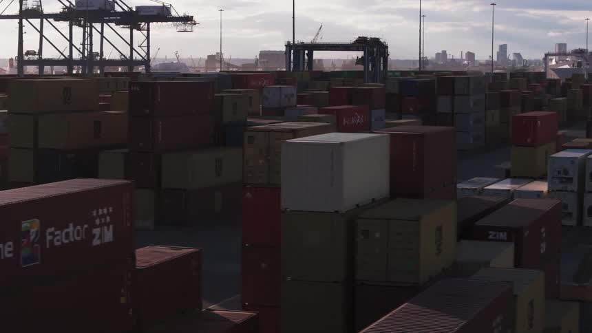 Aerial view of a port with stacks of containers