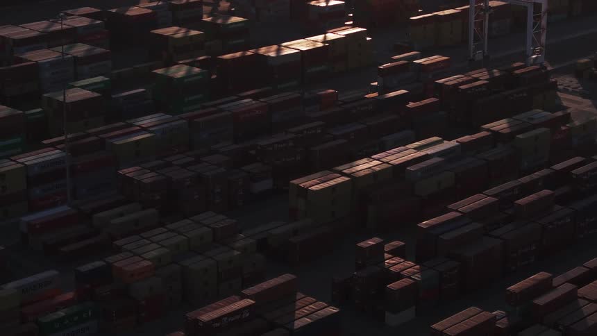 Aerial view on a morning of a port full of organized containers