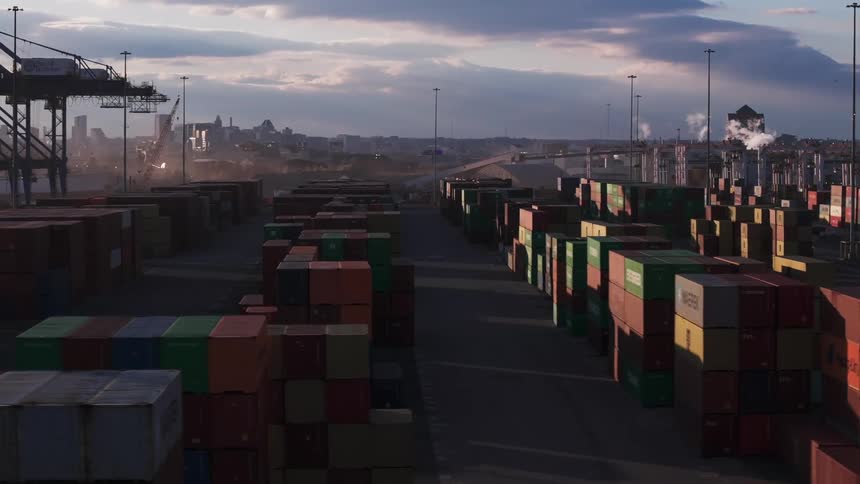 Aerial panorama of a port with containers on a cloudy morning