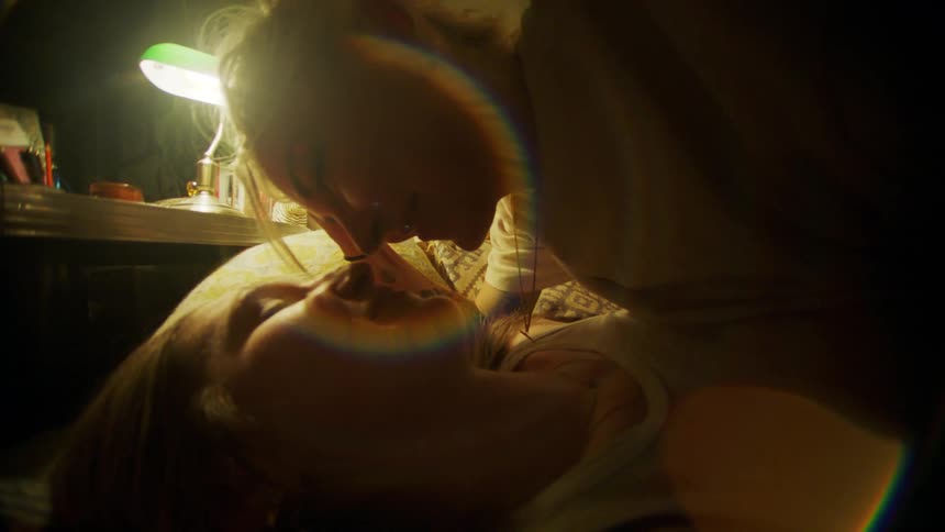 A clip of two ladies kissing