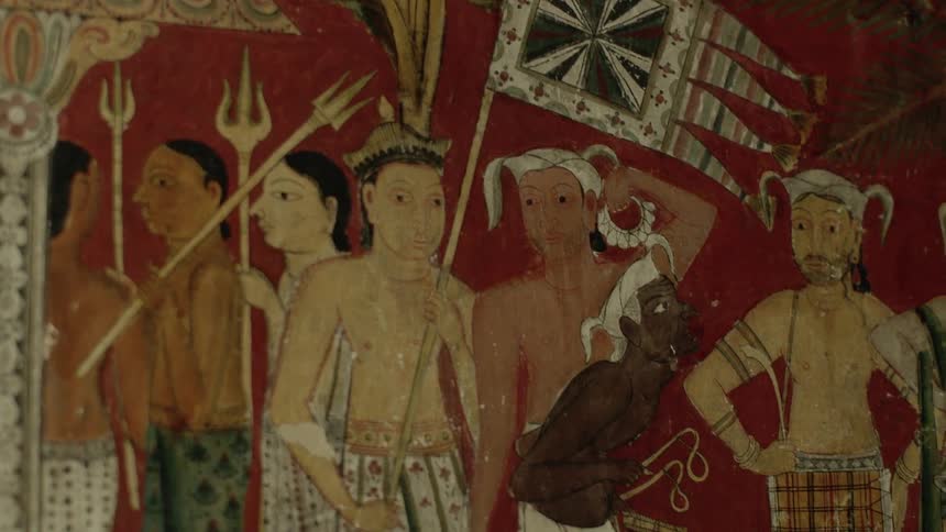 Closeup on a wall with archaic drawings