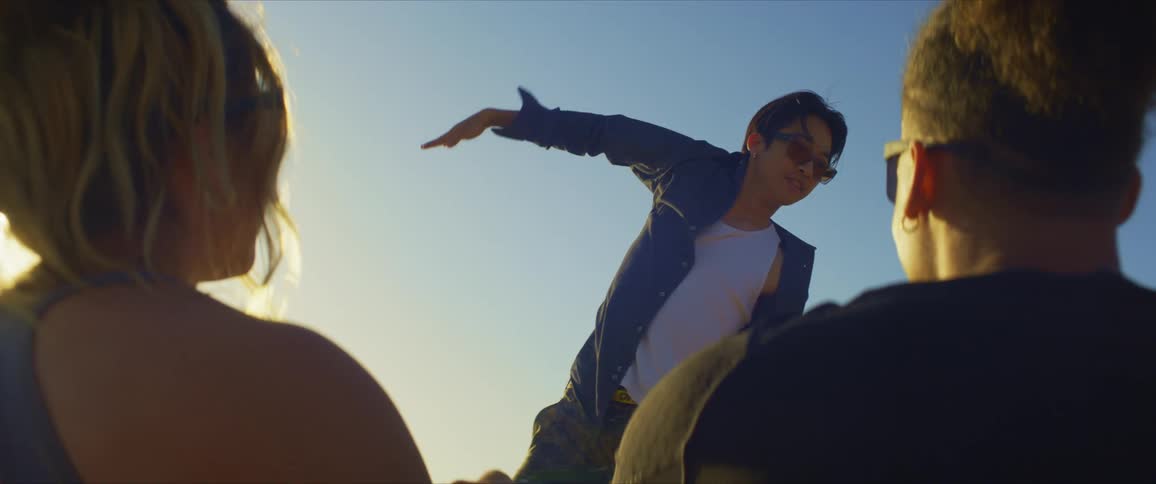 A teenager dances for his friends