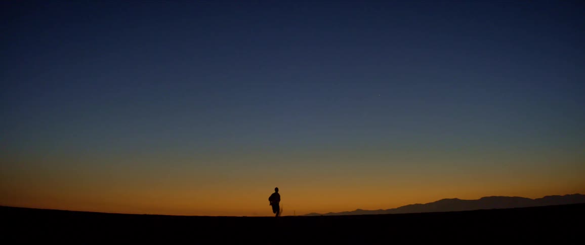 A clip of a person running at night