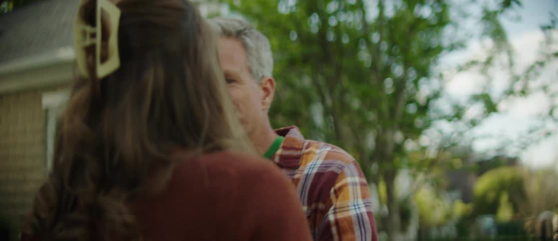 A clip of a father and the daughter hugging