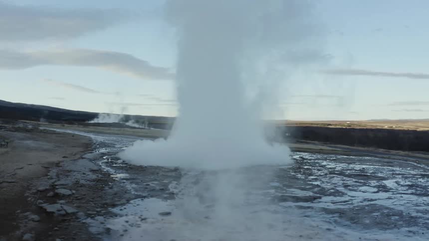 Geyser rising from a natural soil
