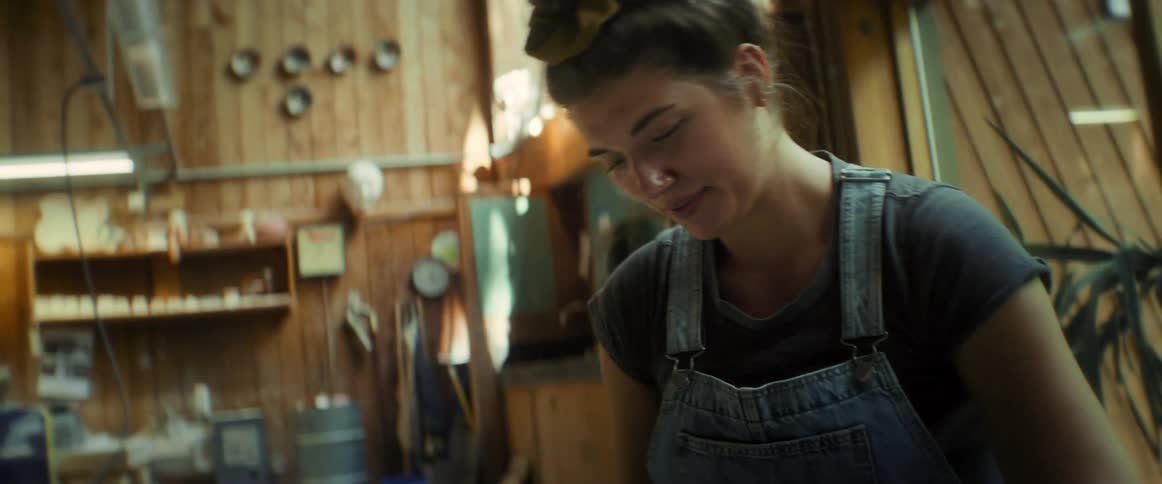 Portrait of a woman smiling indoors working