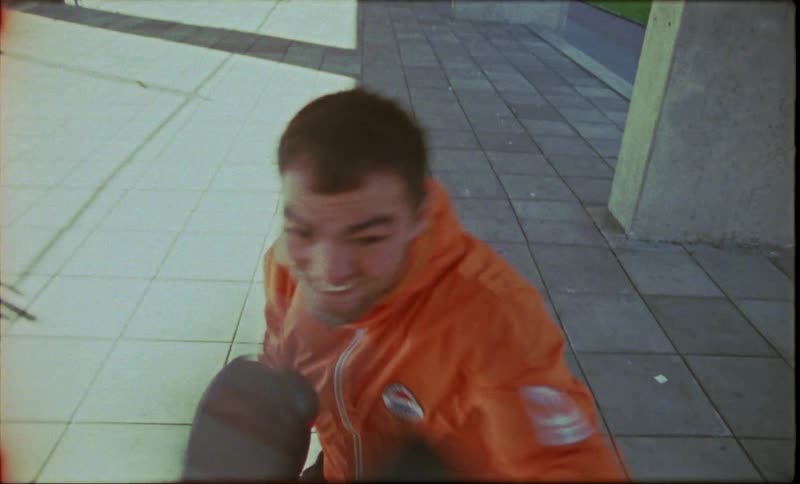 Two boxers sparring in the street enjoying themselves