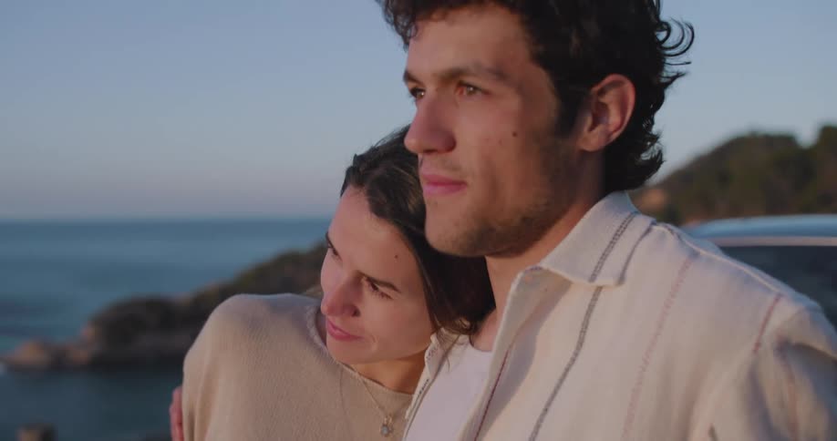 Couple embracing enjoying the natural view of the sunset