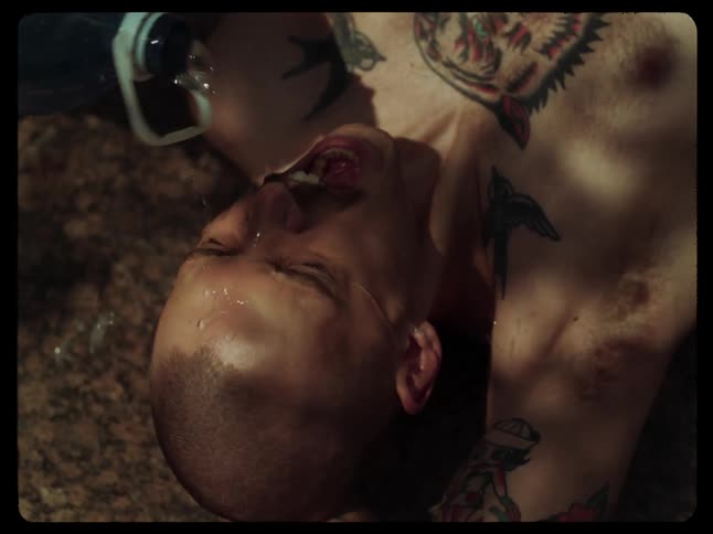 A clip of a male laying on the floor