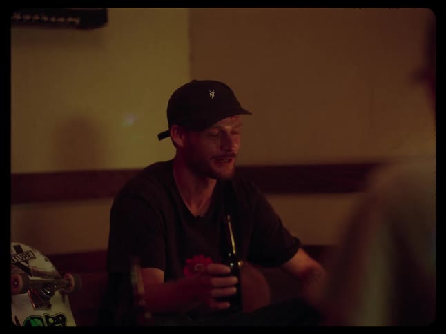 A footage of a person drinking in a bar