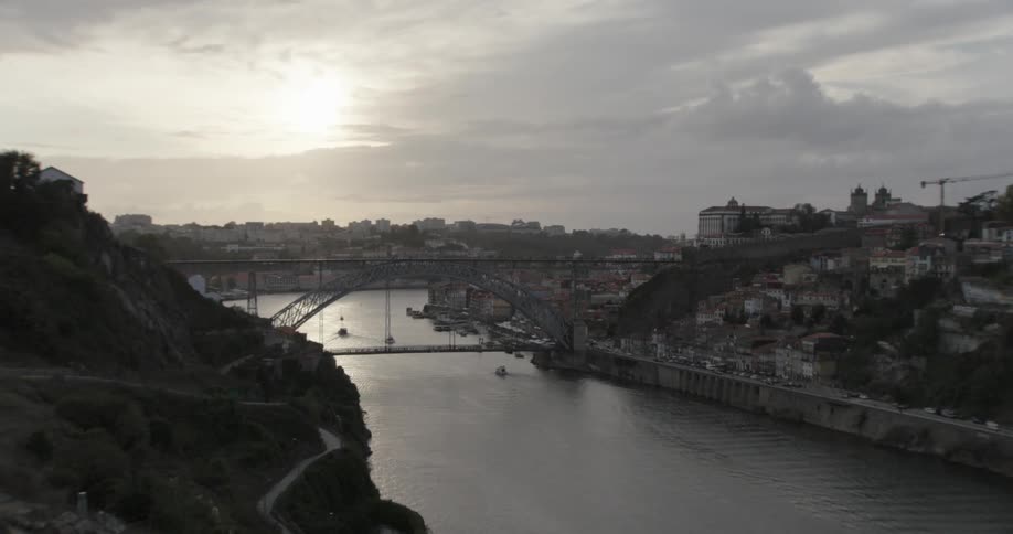 The lus i bridge a doubledecker metal arch bridge majestically spans the douro river in porto portugal
