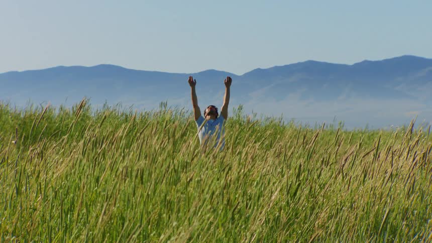 A clip of a man stretching in the bush