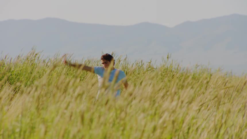 A clip of a man dancing in the bush
