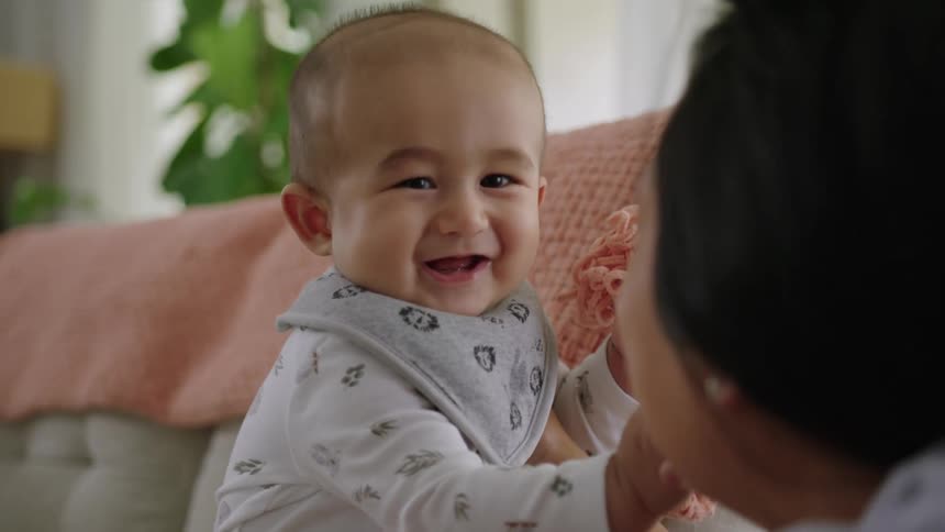 A clip of a mother playing with her kid