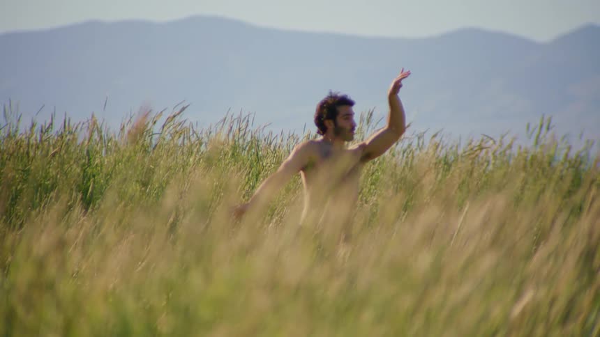 A clip of a man dancing in the bush