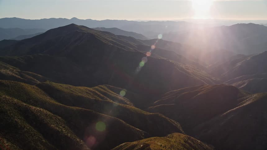 A mountain range at sunrise