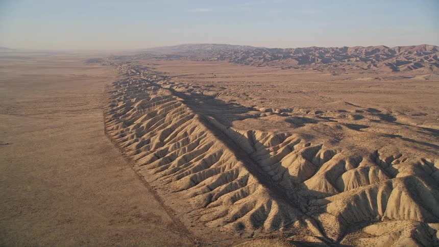 Aerial panorama of a mountain valley in the middle of a desert nature