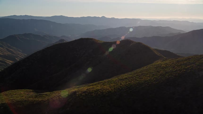 A mountain range during sunrise