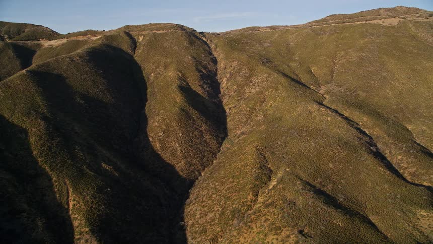 The mountains are covered with green