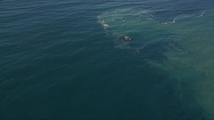Aerial view of a clear blue sea