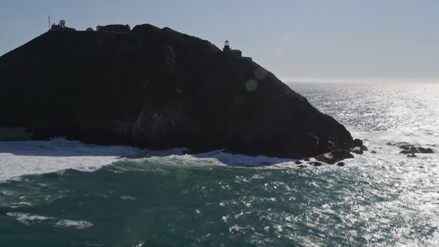 Lighthouse lookout on rocky seaside coast