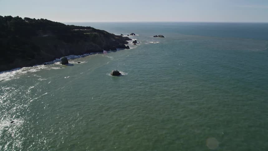 Landscape of a crystal clear sea that bathes the rocky coast