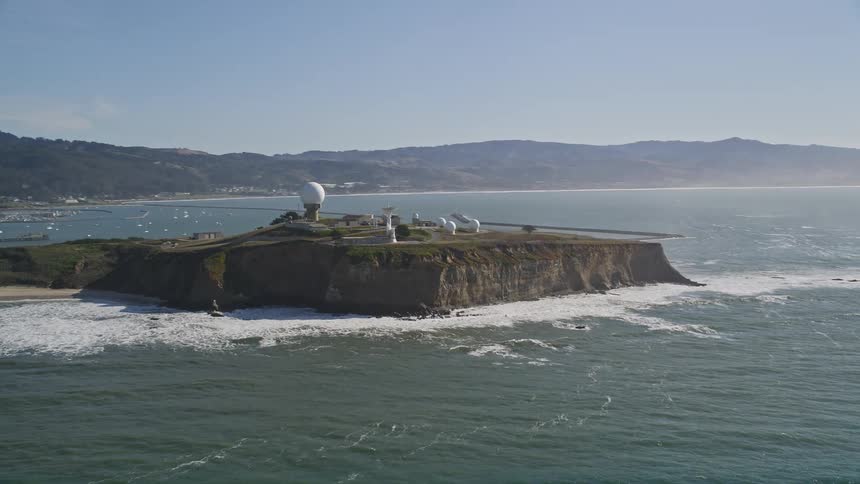 Rocky coast on a seaside peninsula with round domes